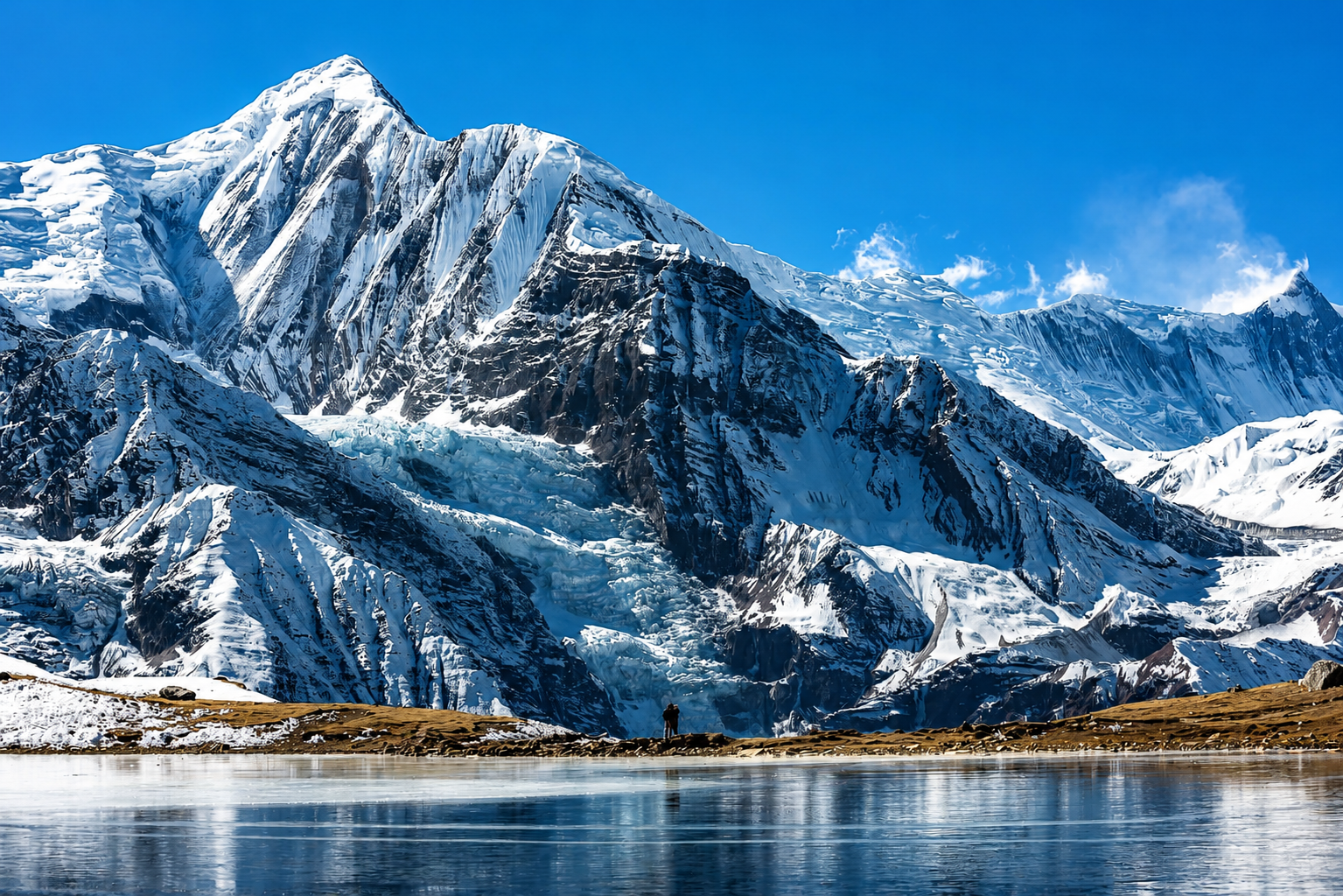 Trekkers walking through the Himalayas in clear weather
