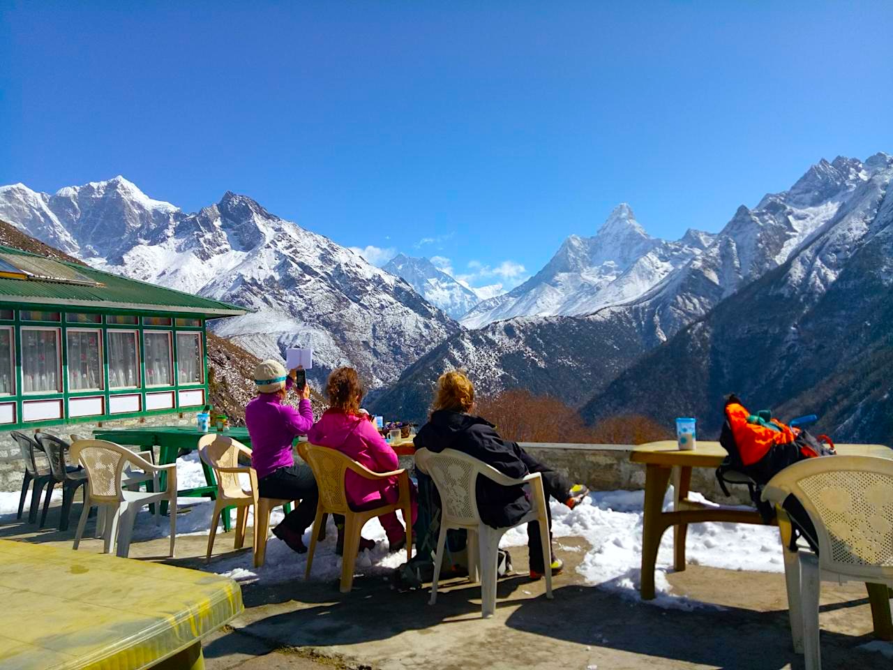 Trekking group beside a Himalayan lake in Nepal